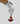 Hand with white golf glove holding leather golf ball holder