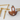 brown blue leather golf ball holder and wooden golf tees