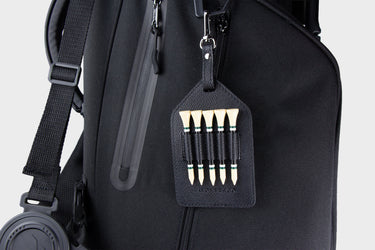 Black golf bag with black Layover & Co. leather golf tee holder 