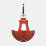 Layover Red leather golf ball holder keychain case with a carabiner on a white background
