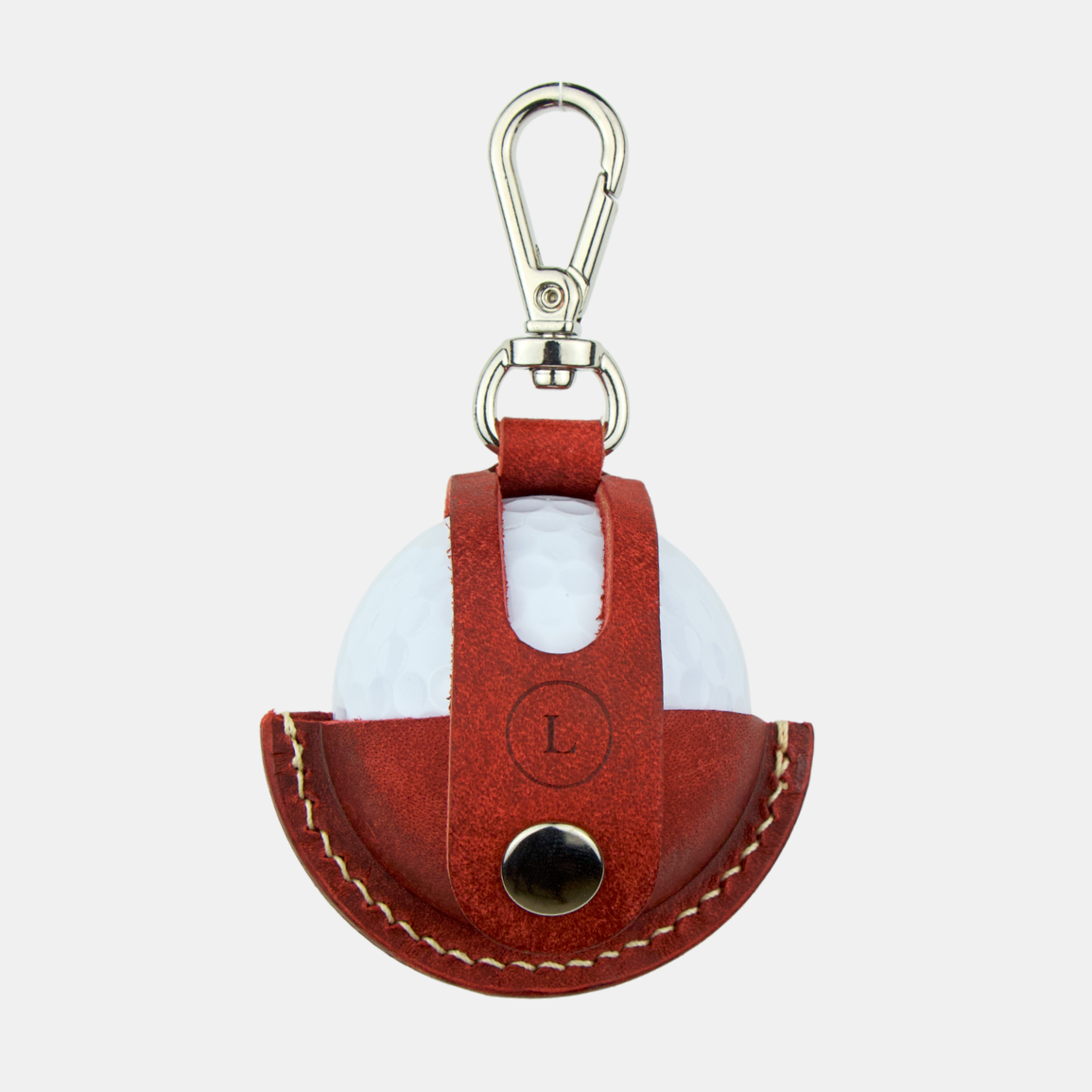 Layover Red leather golf ball holder keychain case with a carabiner on a white background