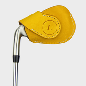 Layover and Co premium magnetic leather golf club head cover with yellow design on a white background