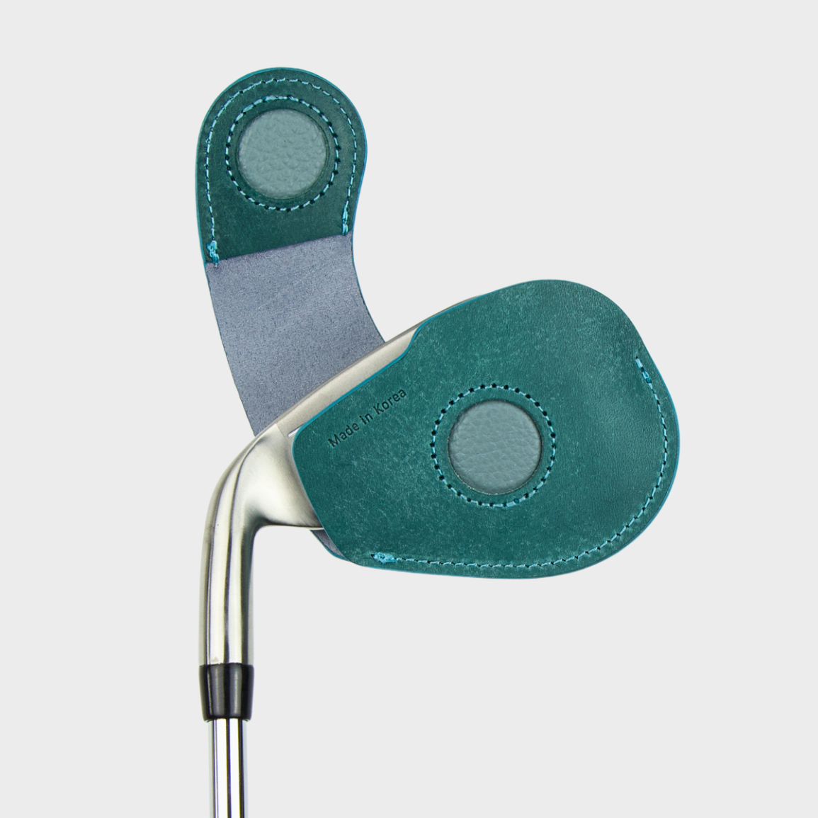 Layover and Co premium magnetic leather golf club head cover with blue cyan design on a white background