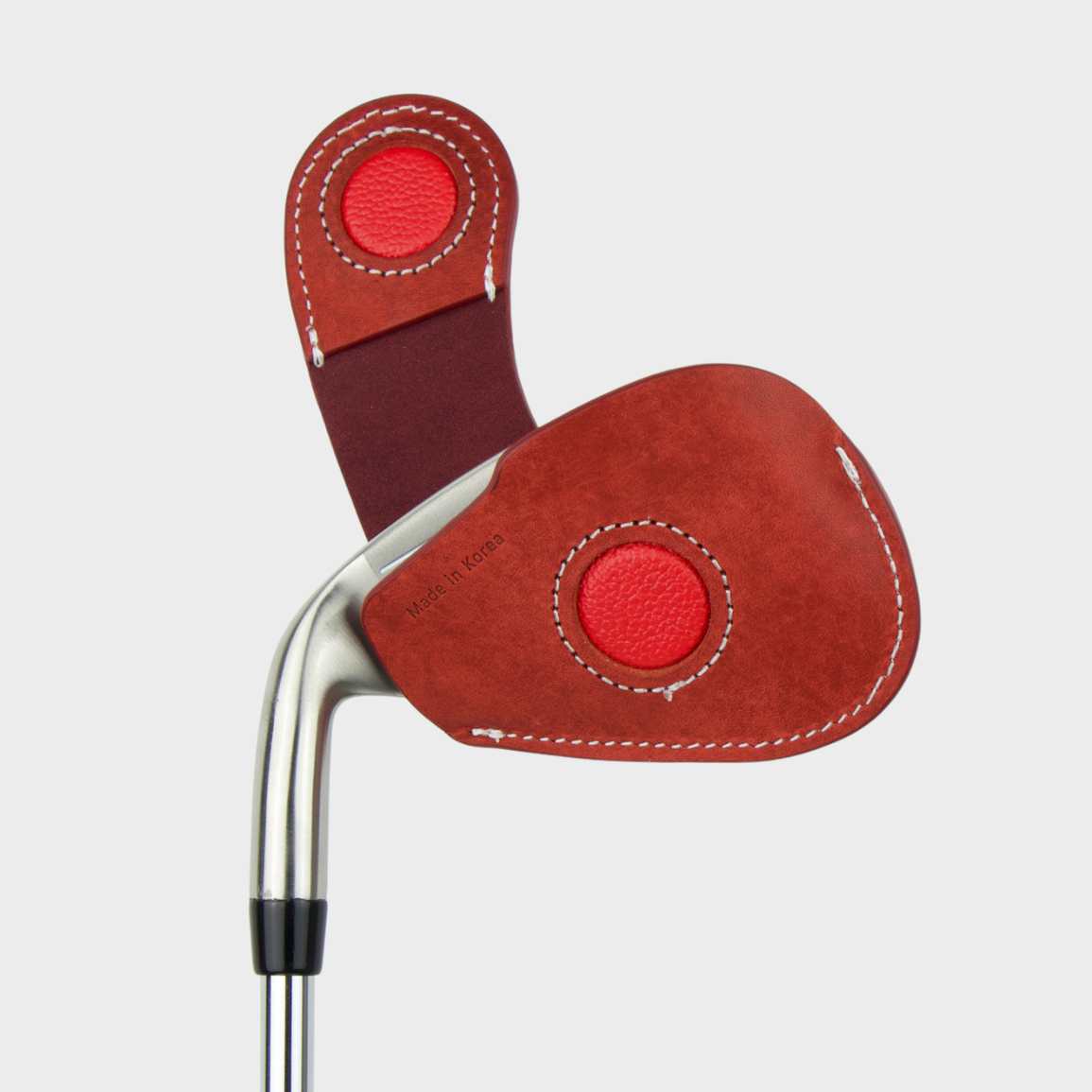 Layover and Co premium magnetic leather golf club head cover with red design on a white background
